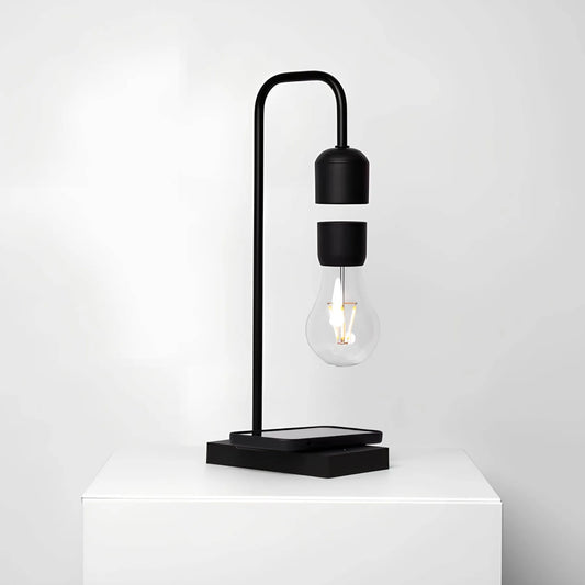 Minimalistische Leviterende LED-lamp met draadloze oplader voor mobiele telefoon