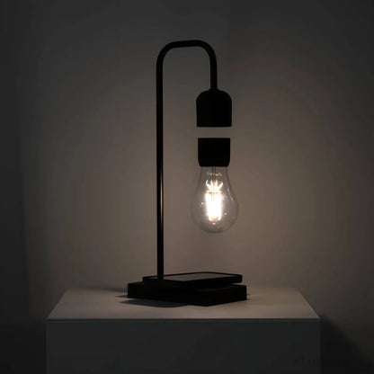 Minimalistische Leviterende LED-lamp met draadloze oplader voor mobiele telefoon